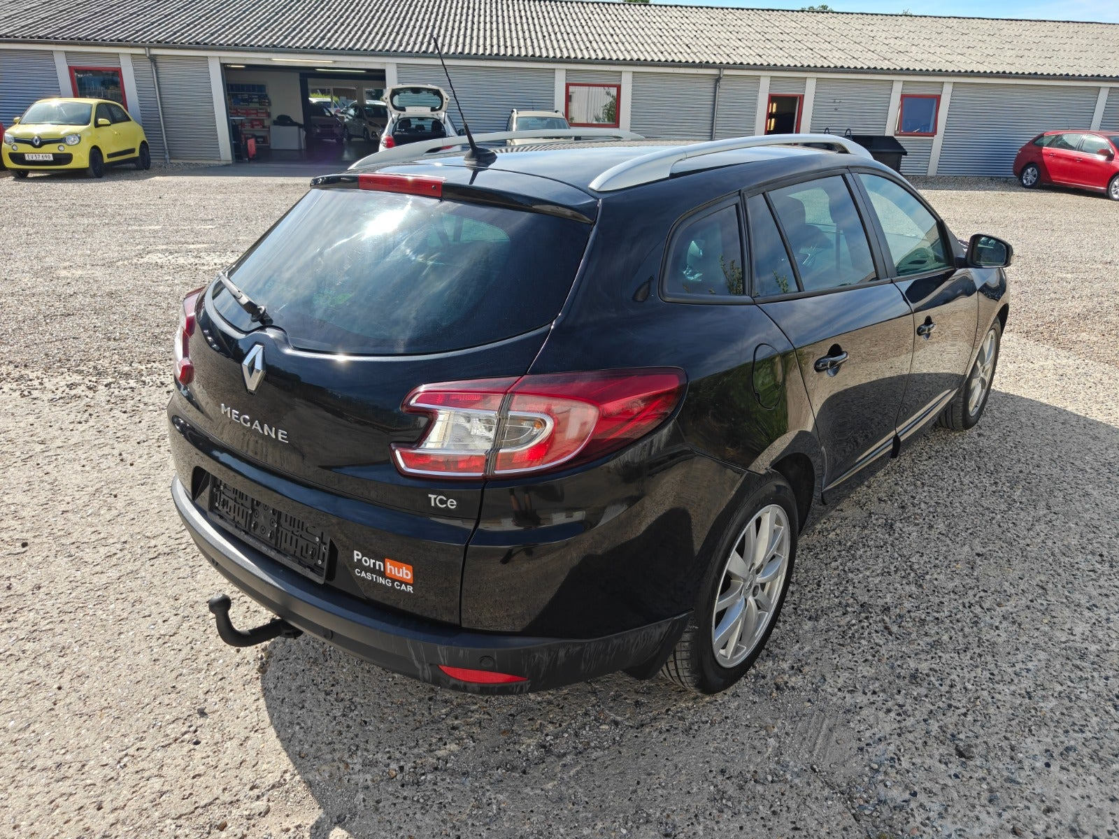 Gul Renault Megane III fra 2013