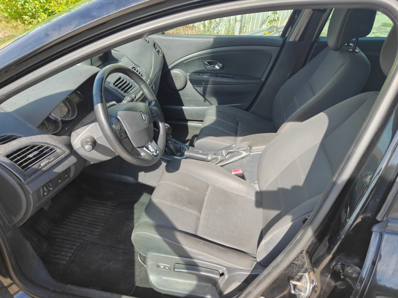 Gul Renault Megane III fra 2013