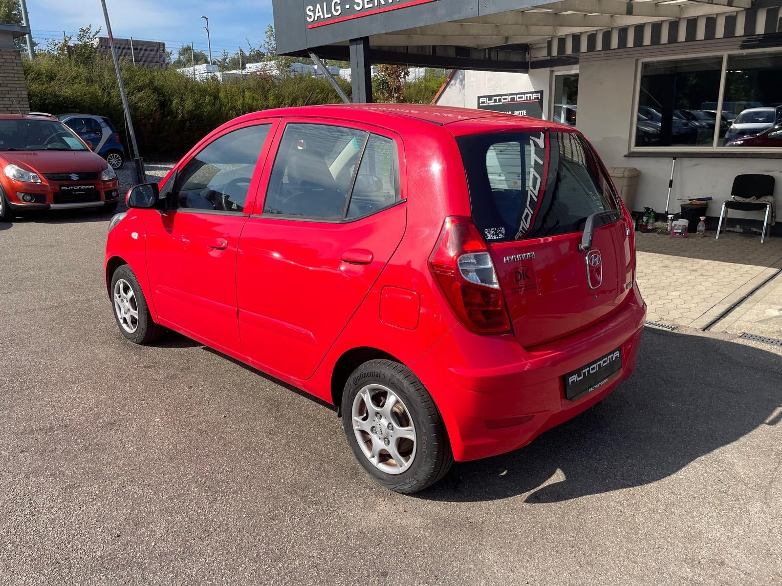 Rød Hyundai i10 fra 2013