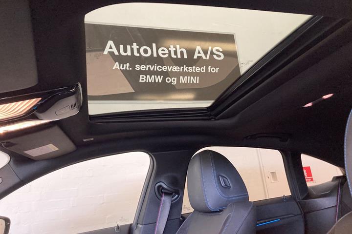 Grå BMW i4 fra 2023