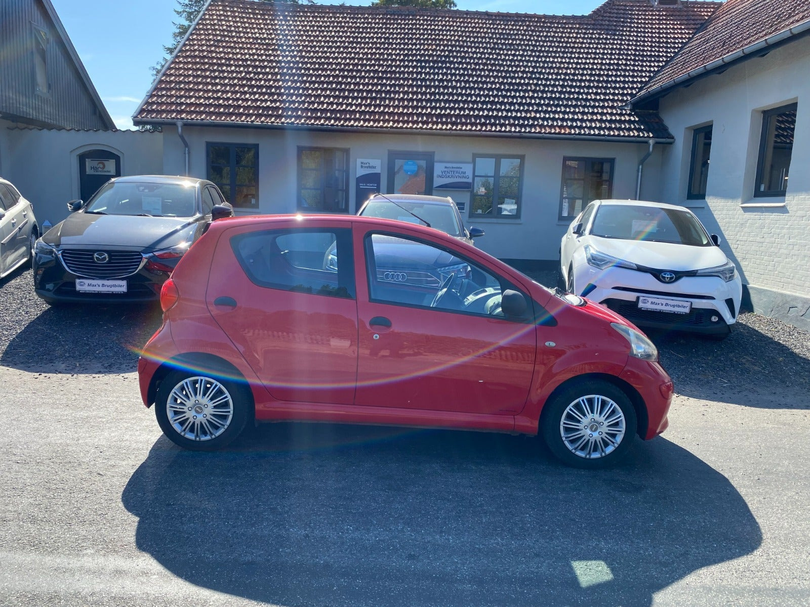 Gul Toyota Aygo fra 2007