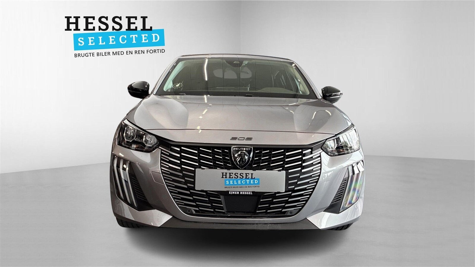 Grå Peugeot e-208 fra 2024