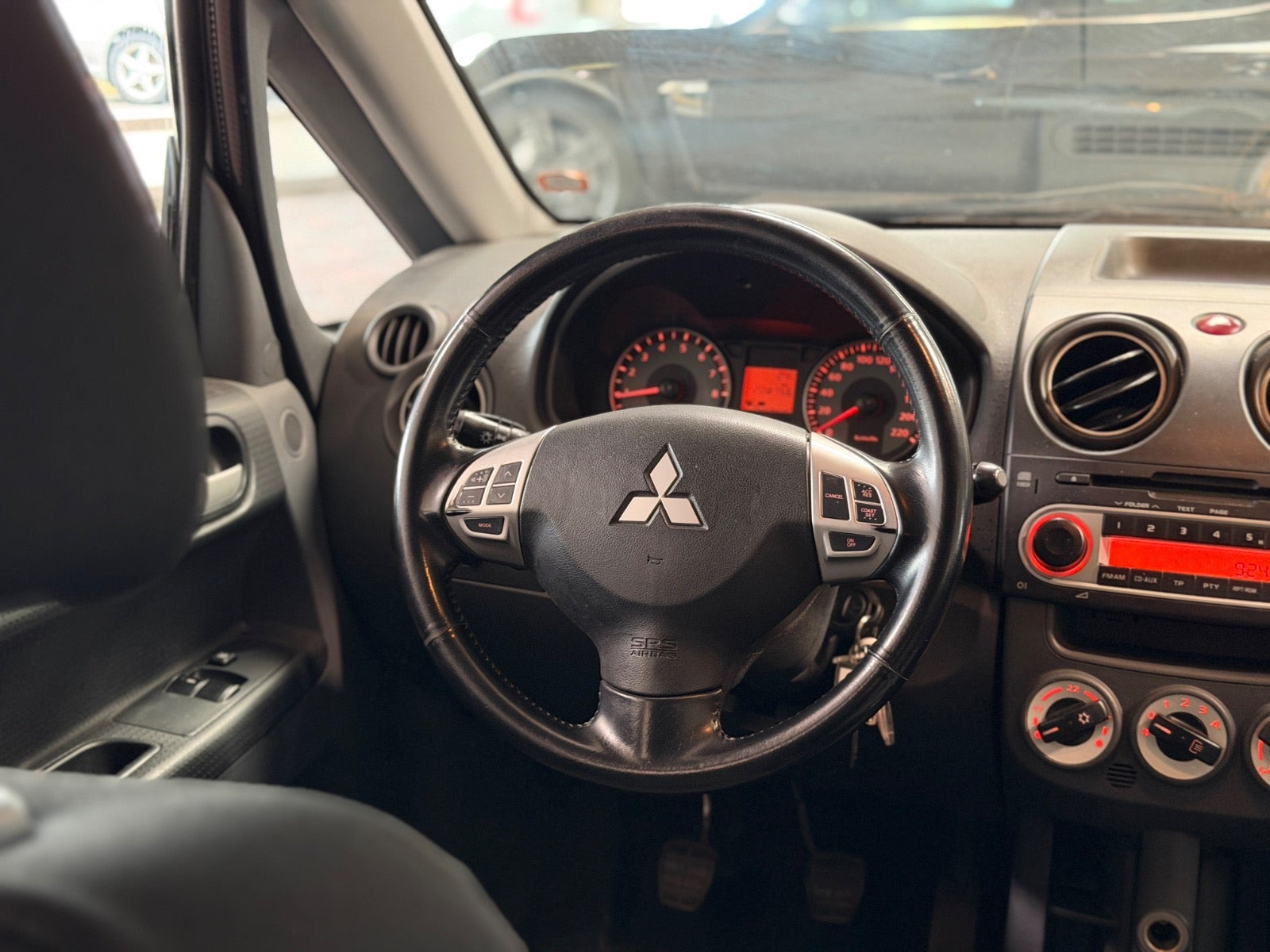 Grøn Mitsubishi Colt fra 2010