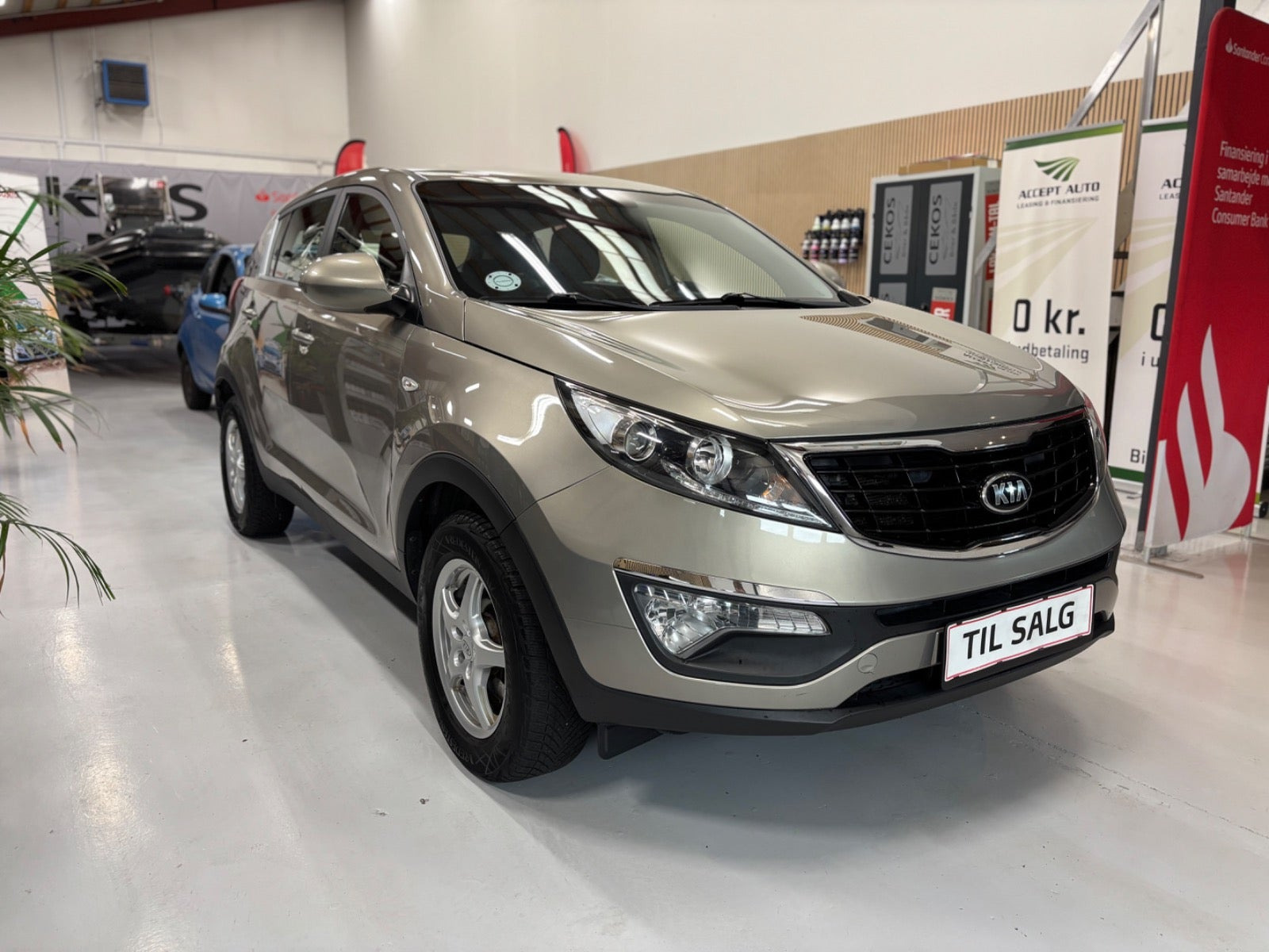 Orange Kia Sportage fra 2014