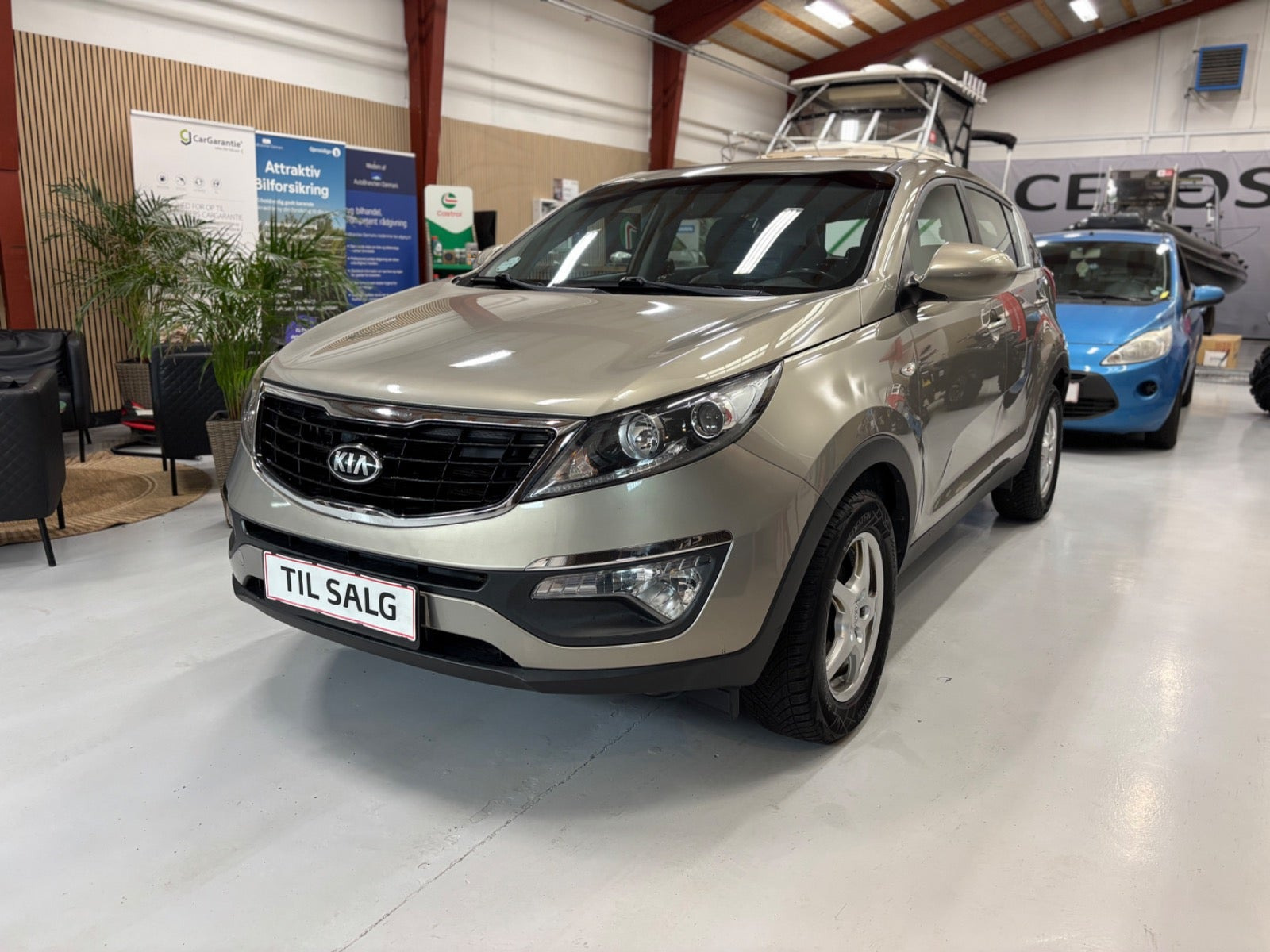 Orange Kia Sportage fra 2014