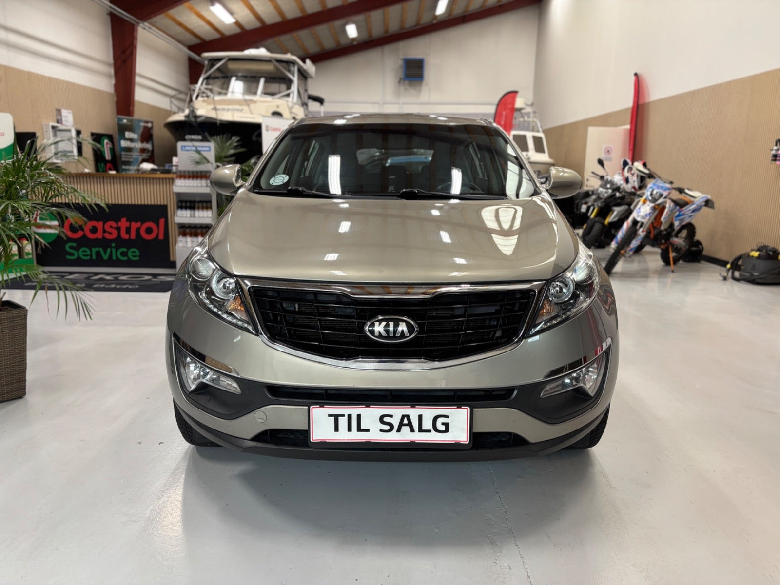 Orange Kia Sportage fra 2014