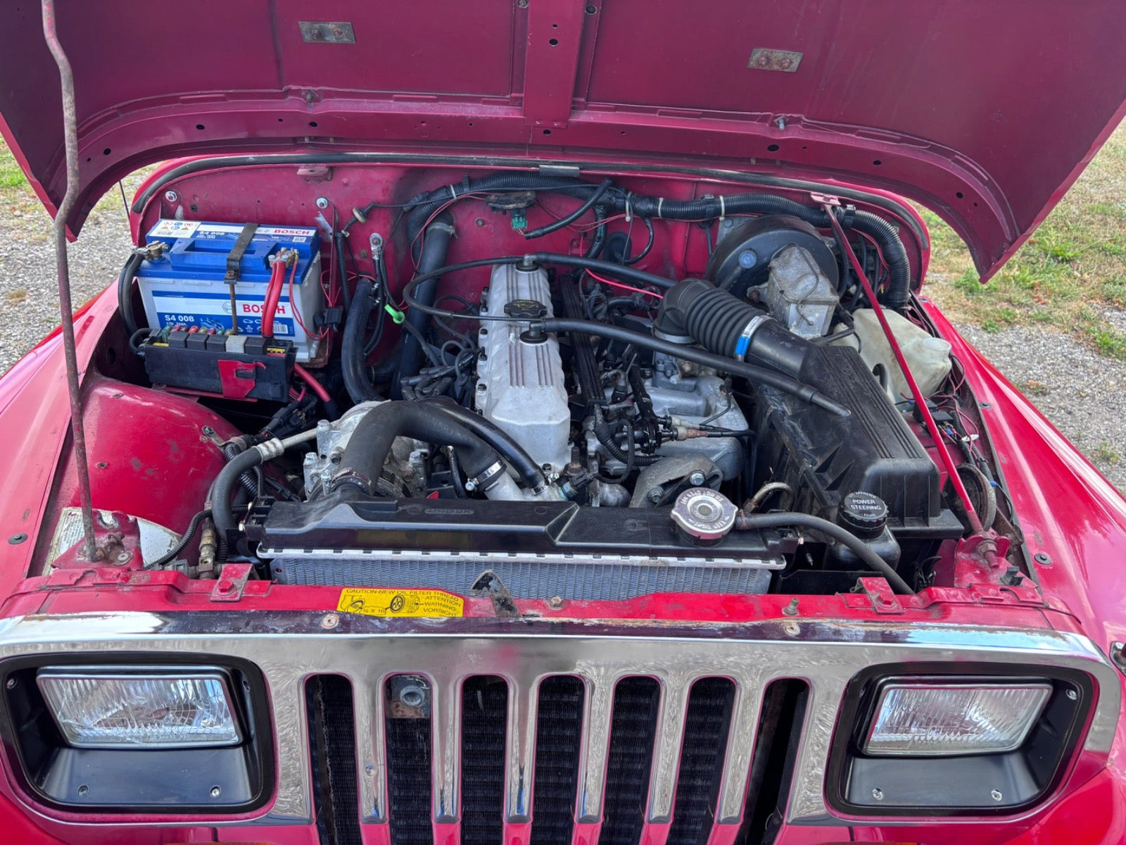 Gul Jeep Wrangler fra 1992