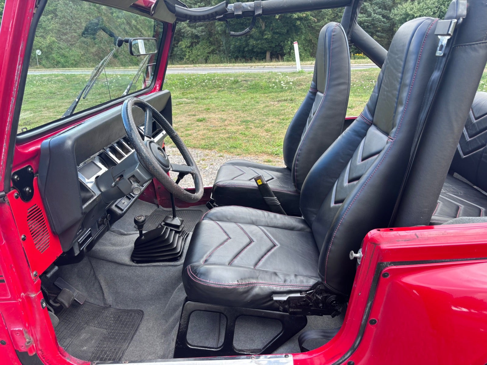 Gul Jeep Wrangler fra 1992
