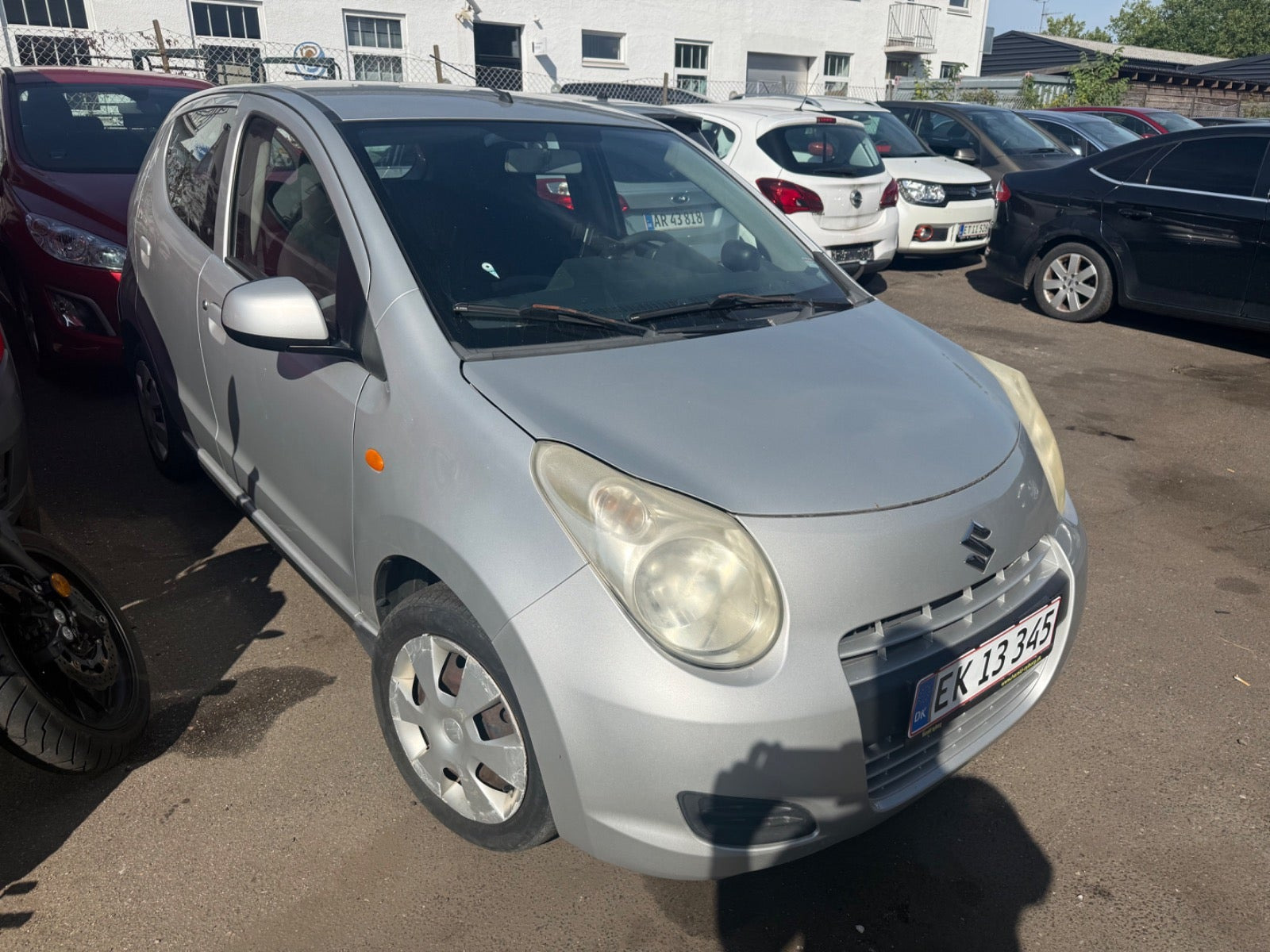 Grå Suzuki Alto fra 2009