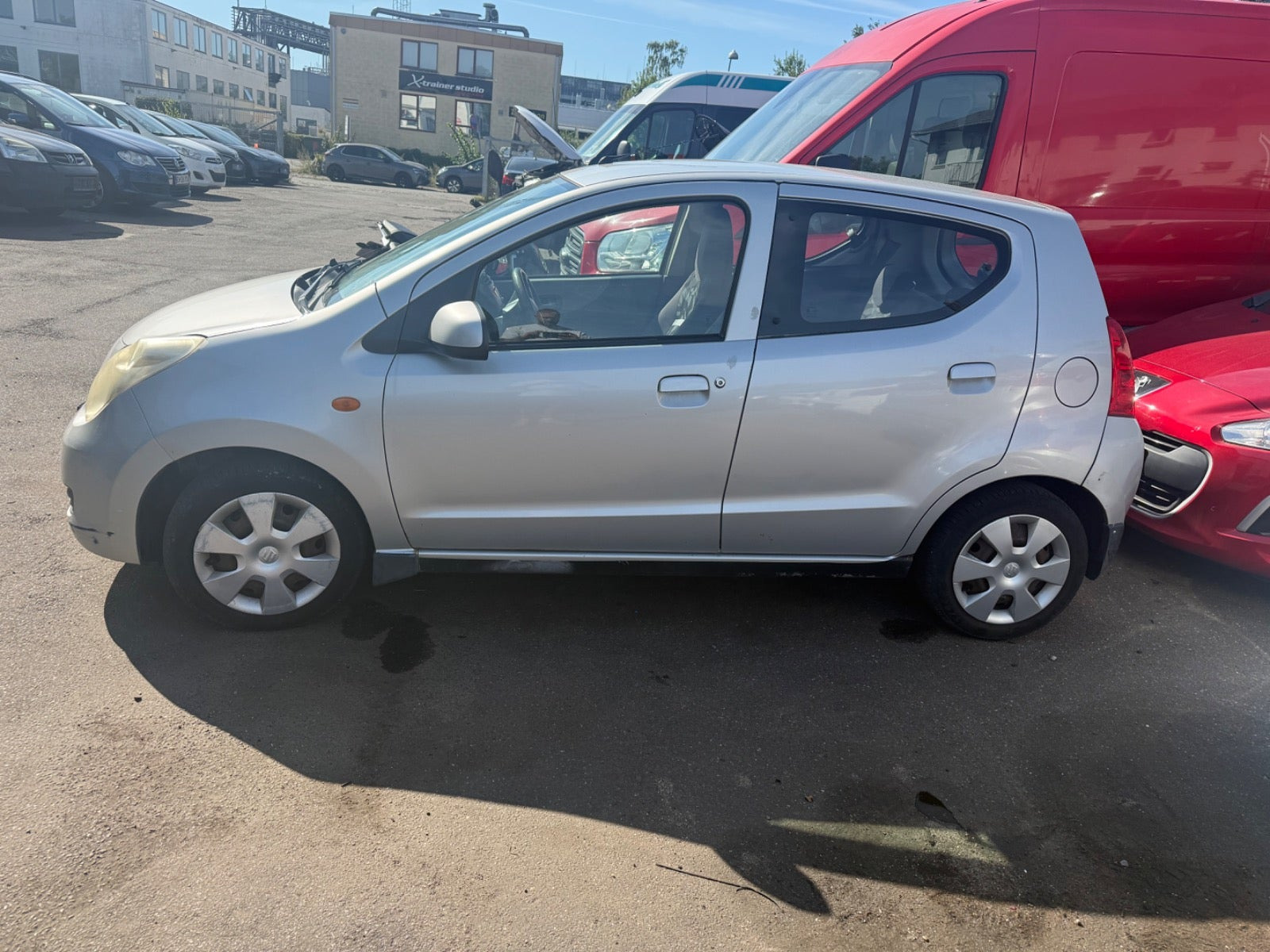Grå Suzuki Alto fra 2009