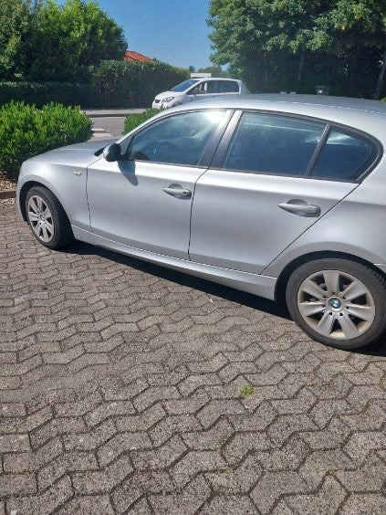 Sølv BMW 118i fra 2007