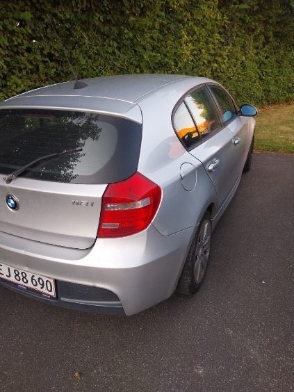 Sølv BMW 118i fra 2007