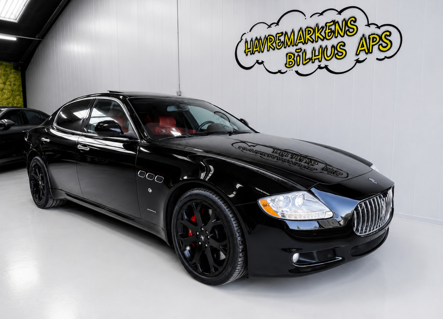Rød Maserati Quattroporte fra 2009