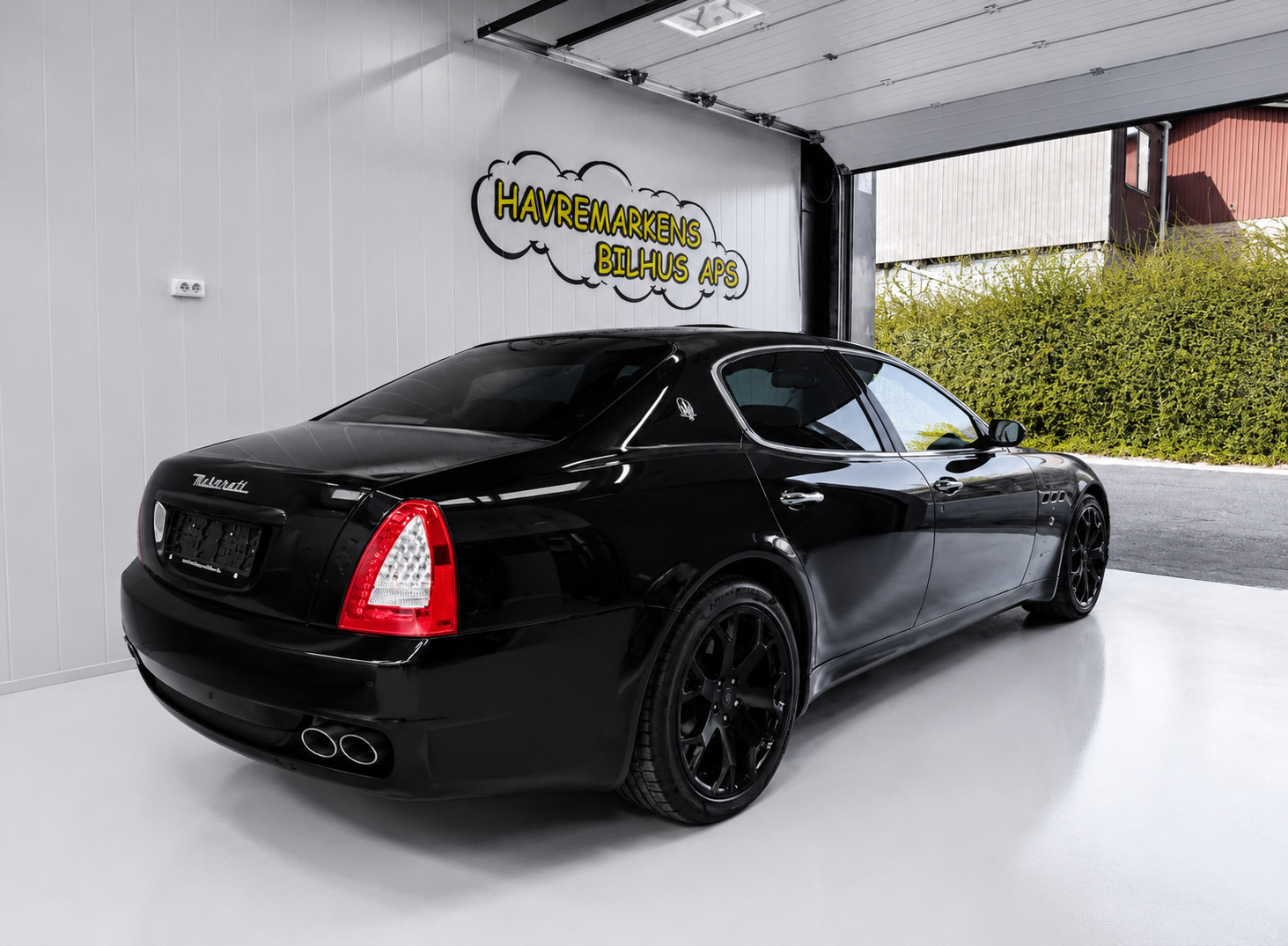 Rød Maserati Quattroporte fra 2009