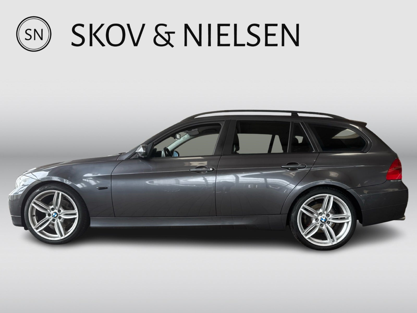 Grå BMW 320d fra 2008