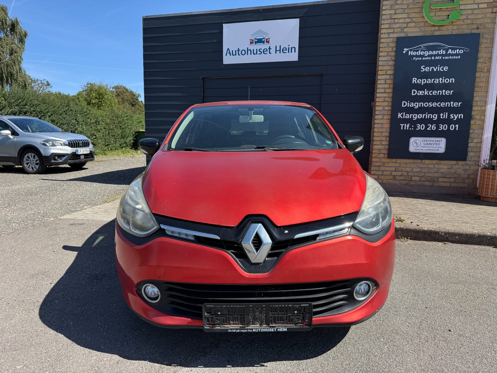 Rød Renault Clio IV fra 2014