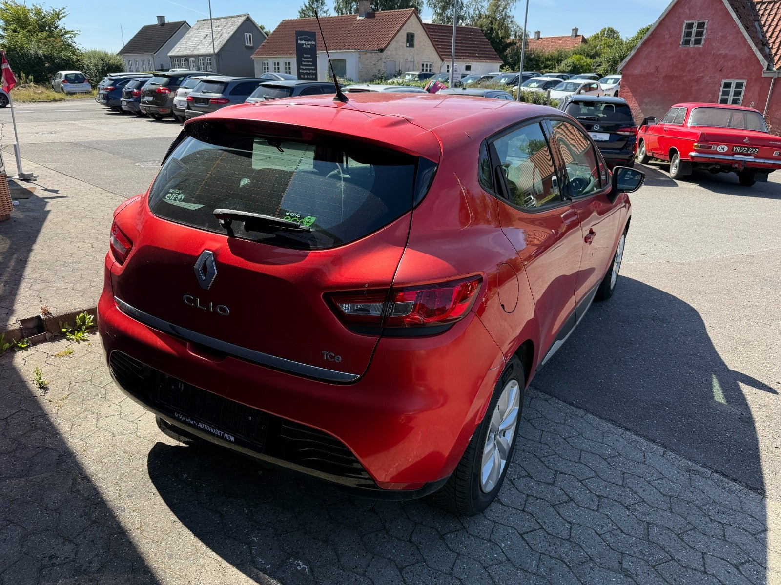 Rød Renault Clio IV fra 2014