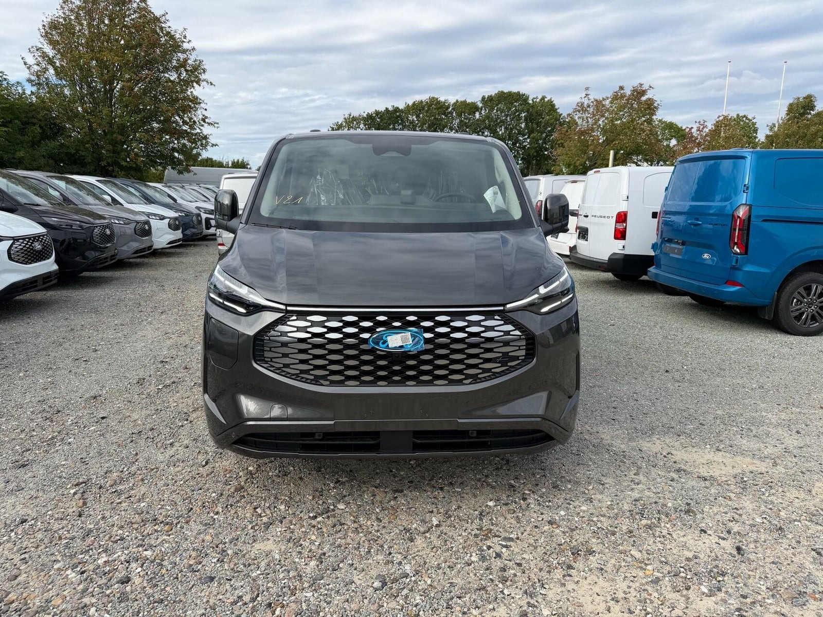 Grå Ford E-Transit Custom 340 L2 fra 2026