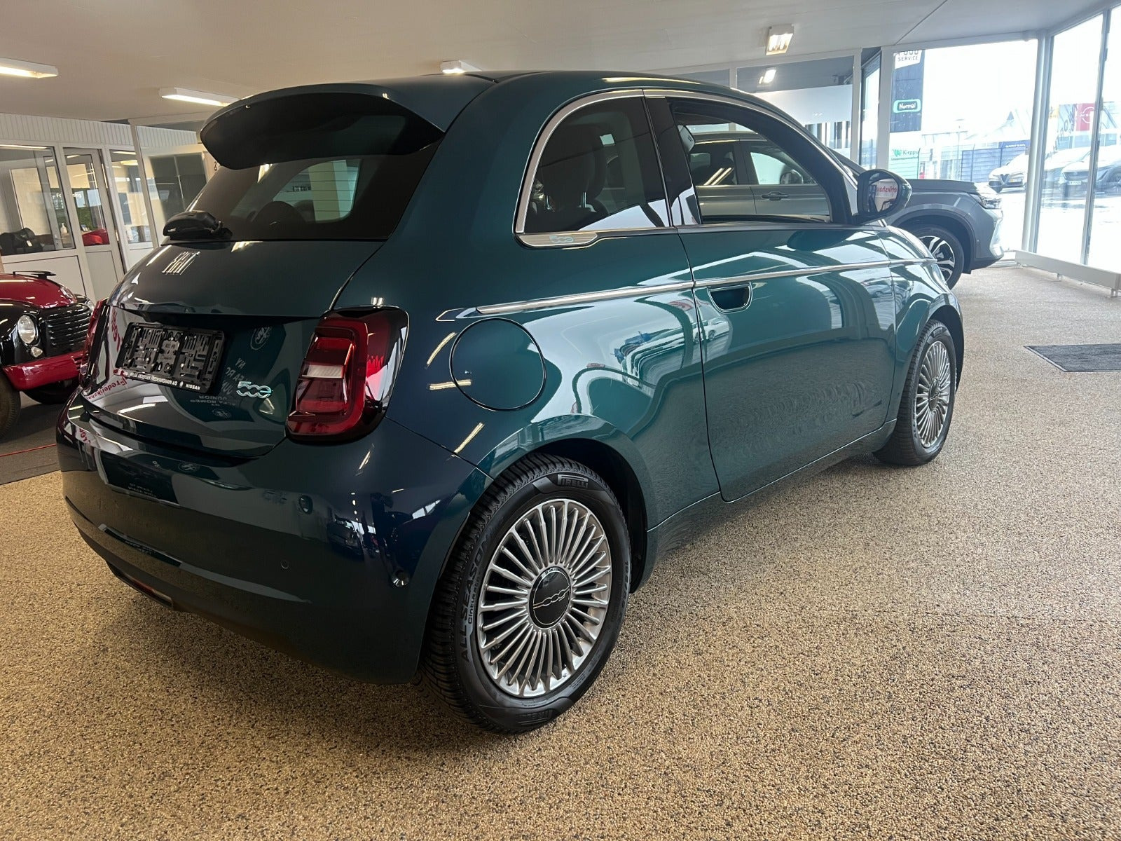Grøn Fiat 500e fra 2024