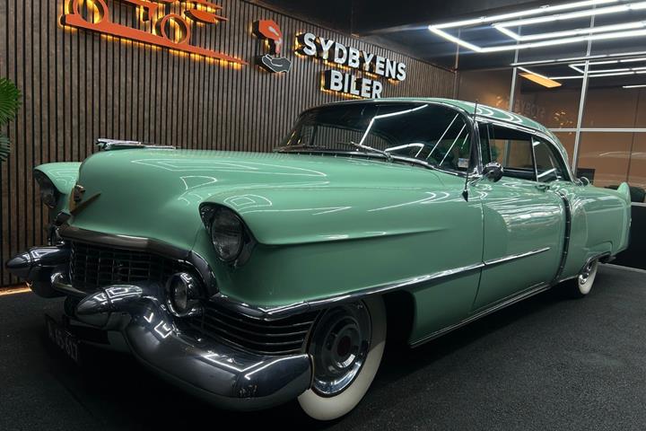 Grøn Cadillac Coupé DeVille fra 1955