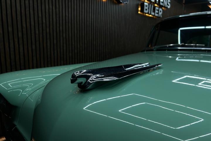 Grøn Cadillac Coupé DeVille fra 1955