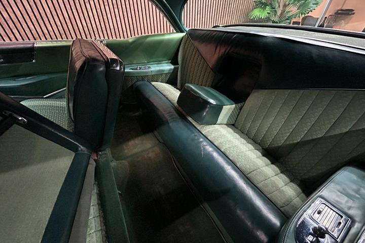 Grøn Cadillac Coupé DeVille fra 1955