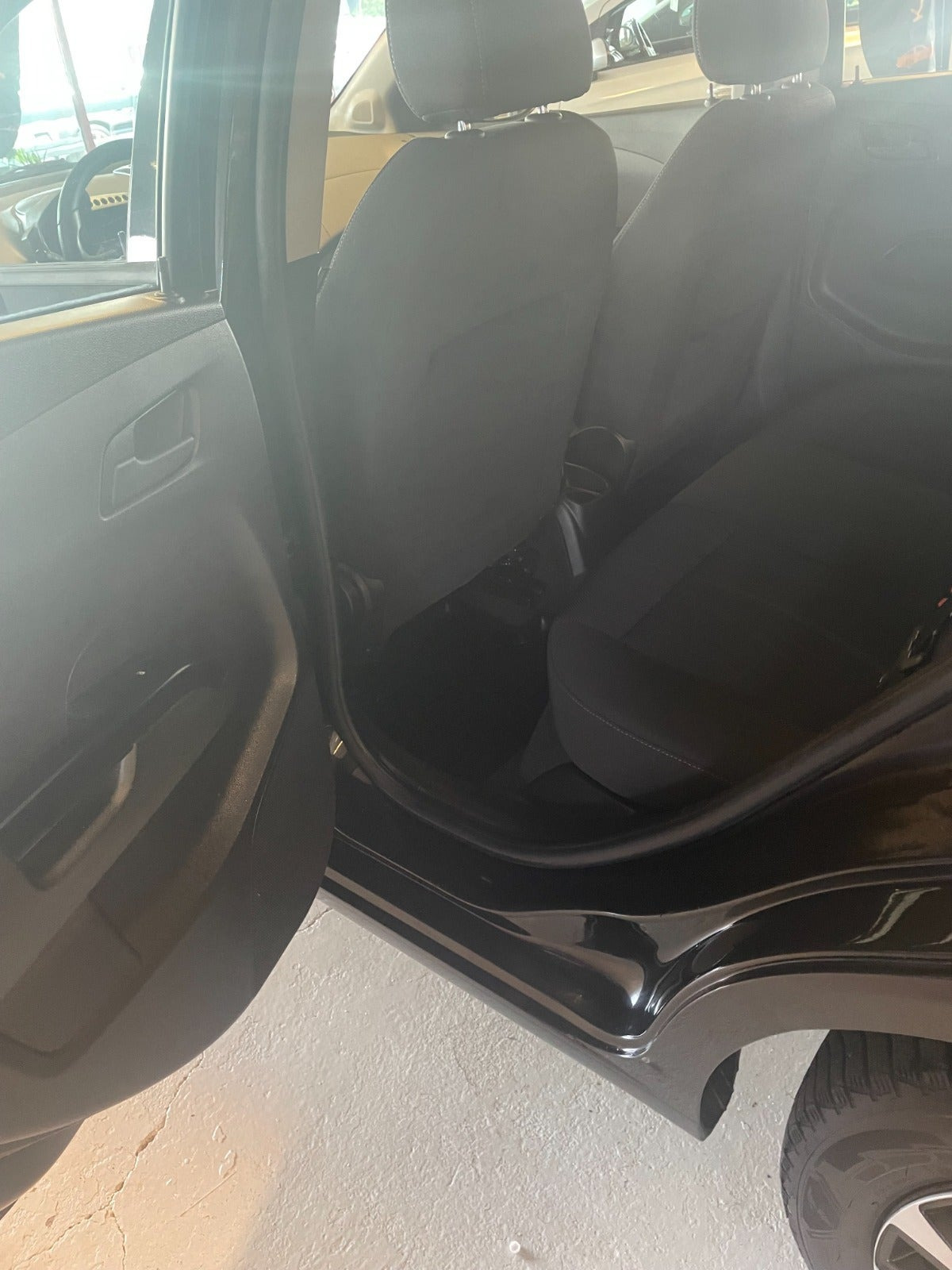 Gul Chevrolet Aveo fra 2013