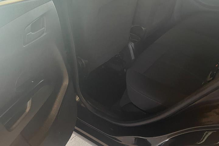 Gul Chevrolet Aveo fra 2013