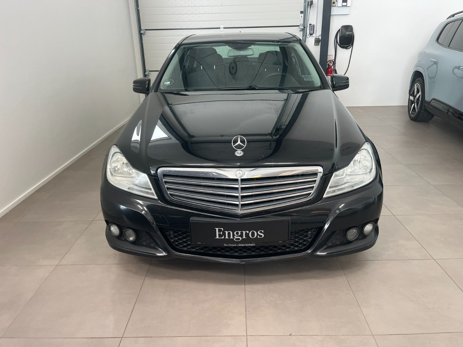 Grøn Mercedes C180 fra 2013