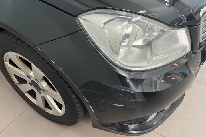 Grøn Mercedes C180 fra 2013