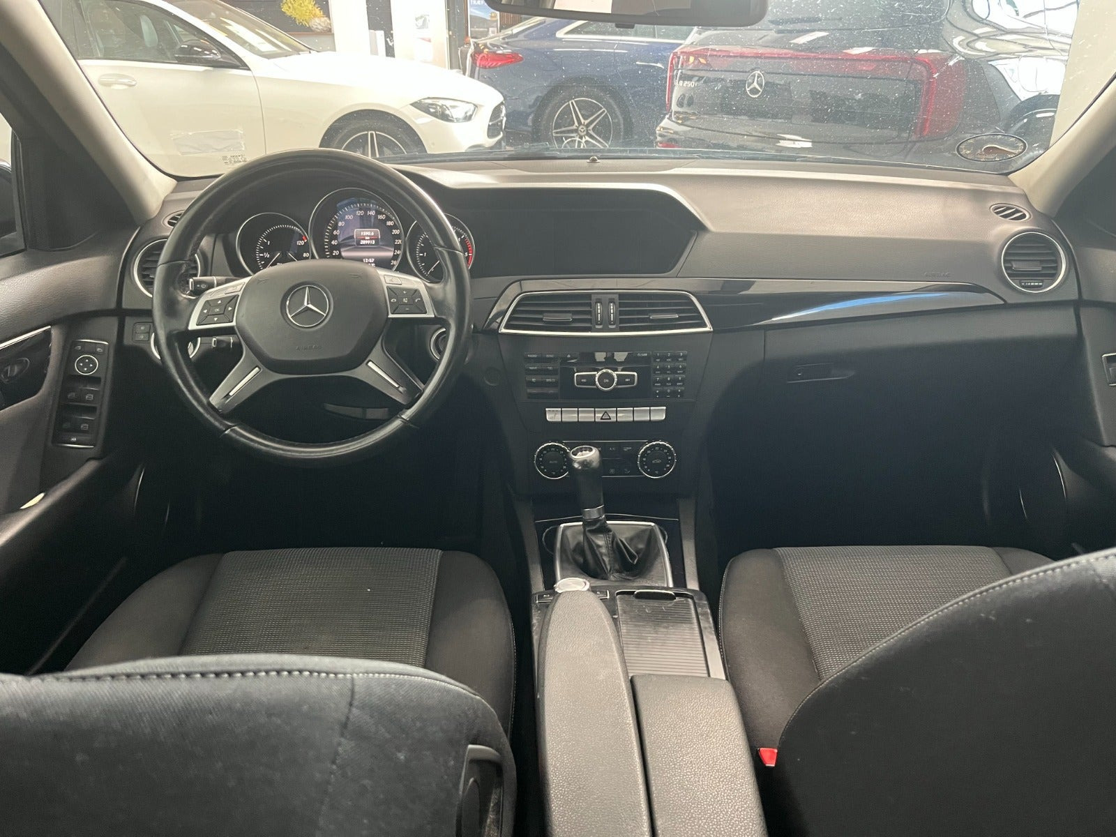 Grøn Mercedes C180 fra 2013