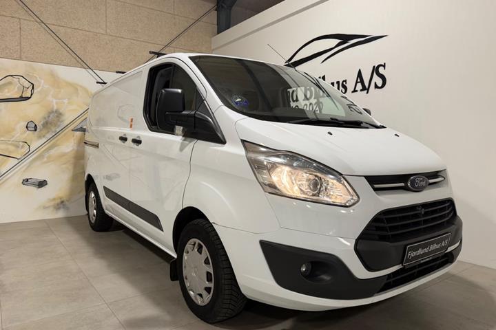 Hvid Ford Transit Custom 270 L1 fra 2015 set udefra