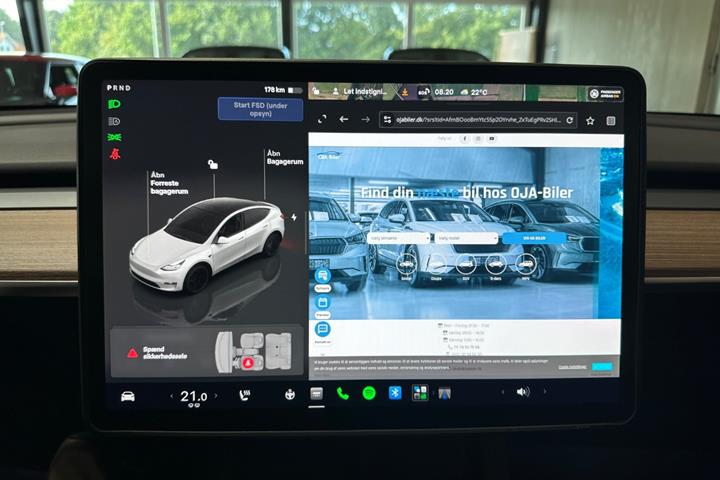 Hvid Tesla Model Y fra 2025
