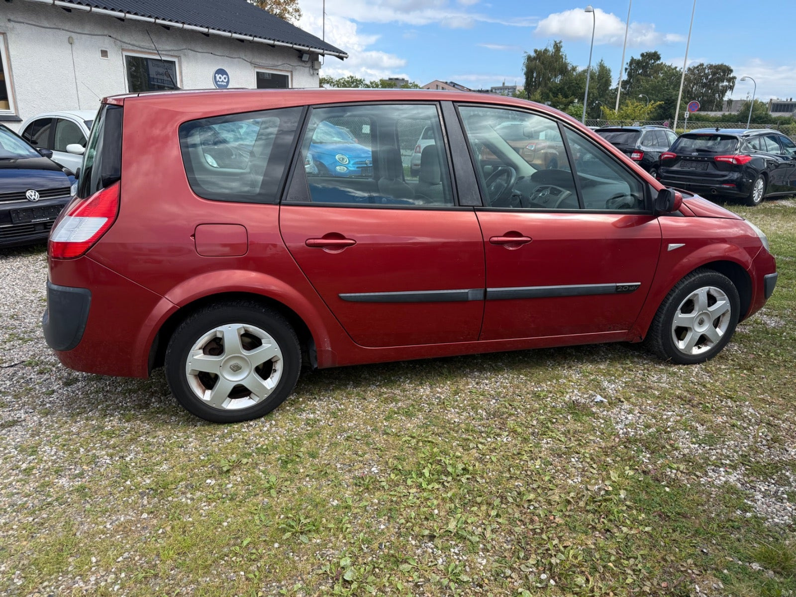 Rød Renault Grand Scenic I fra 2006