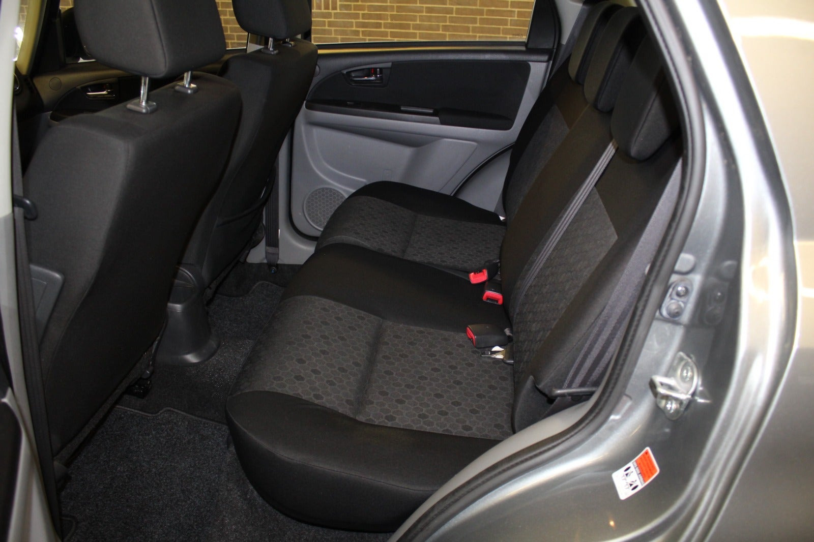 Grå Suzuki SX4 fra 2012
