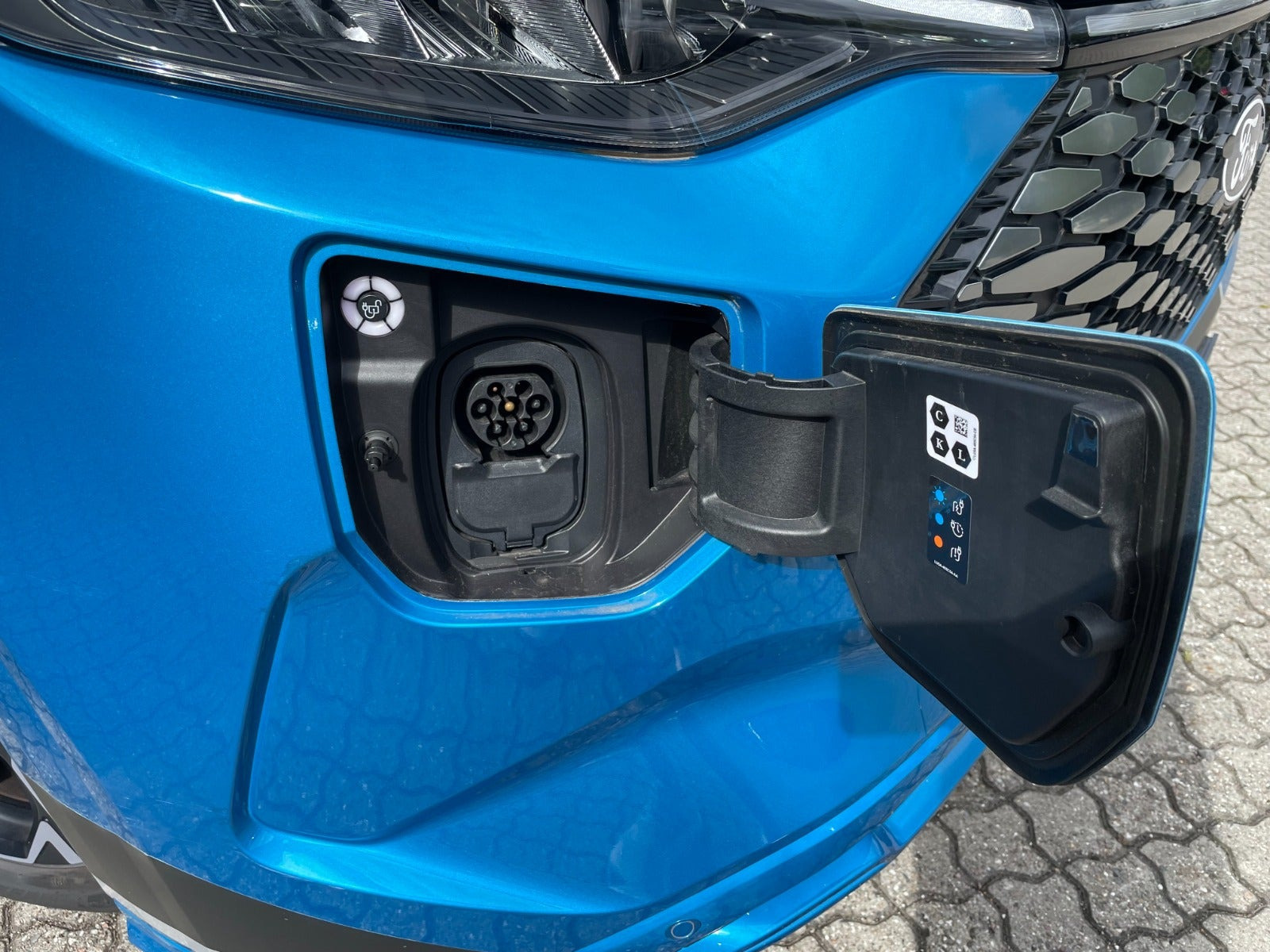 Blå Ford E-Transit Custom 320 L1 fra 2024