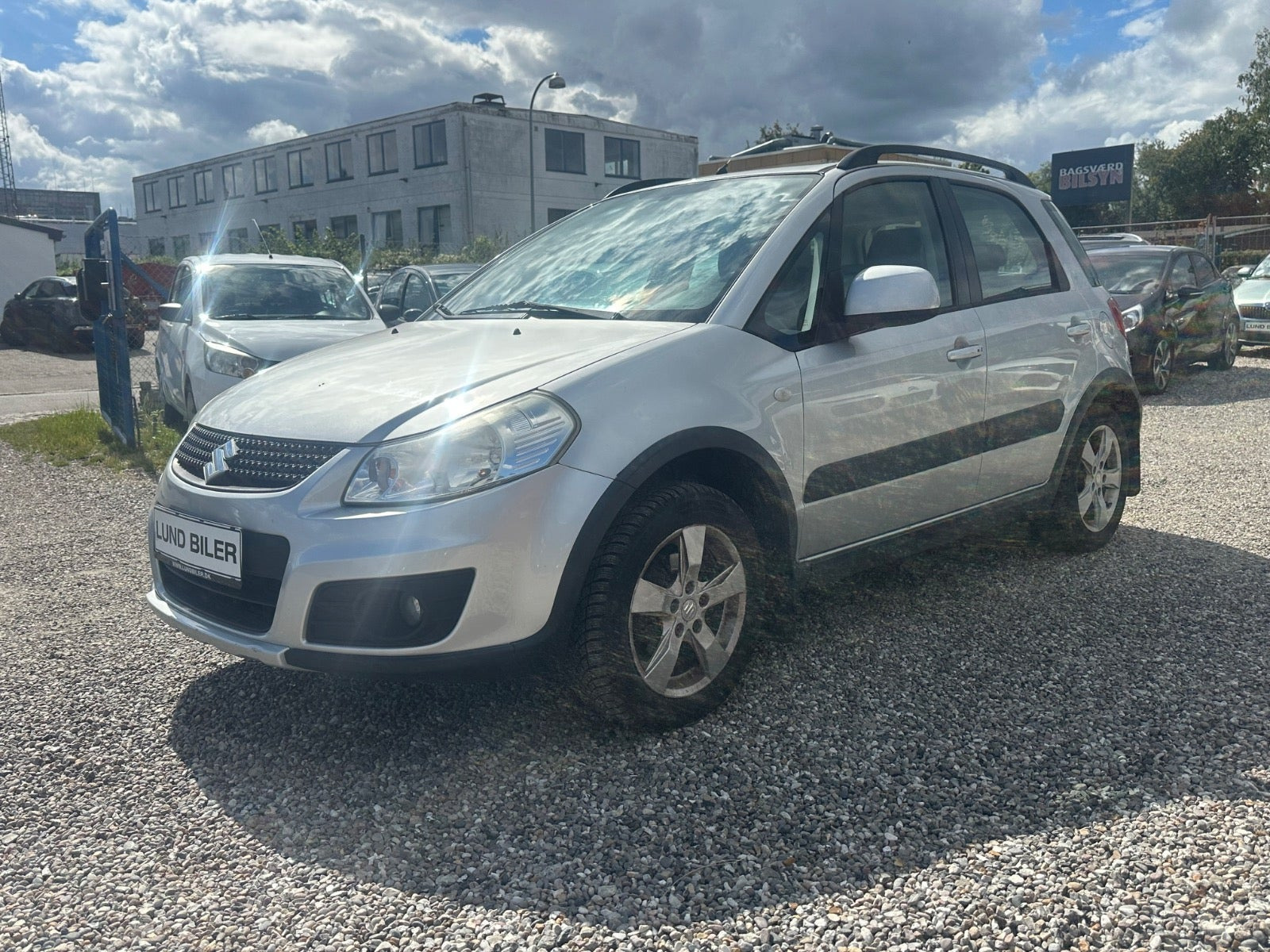Sølv Suzuki SX4 fra 2011