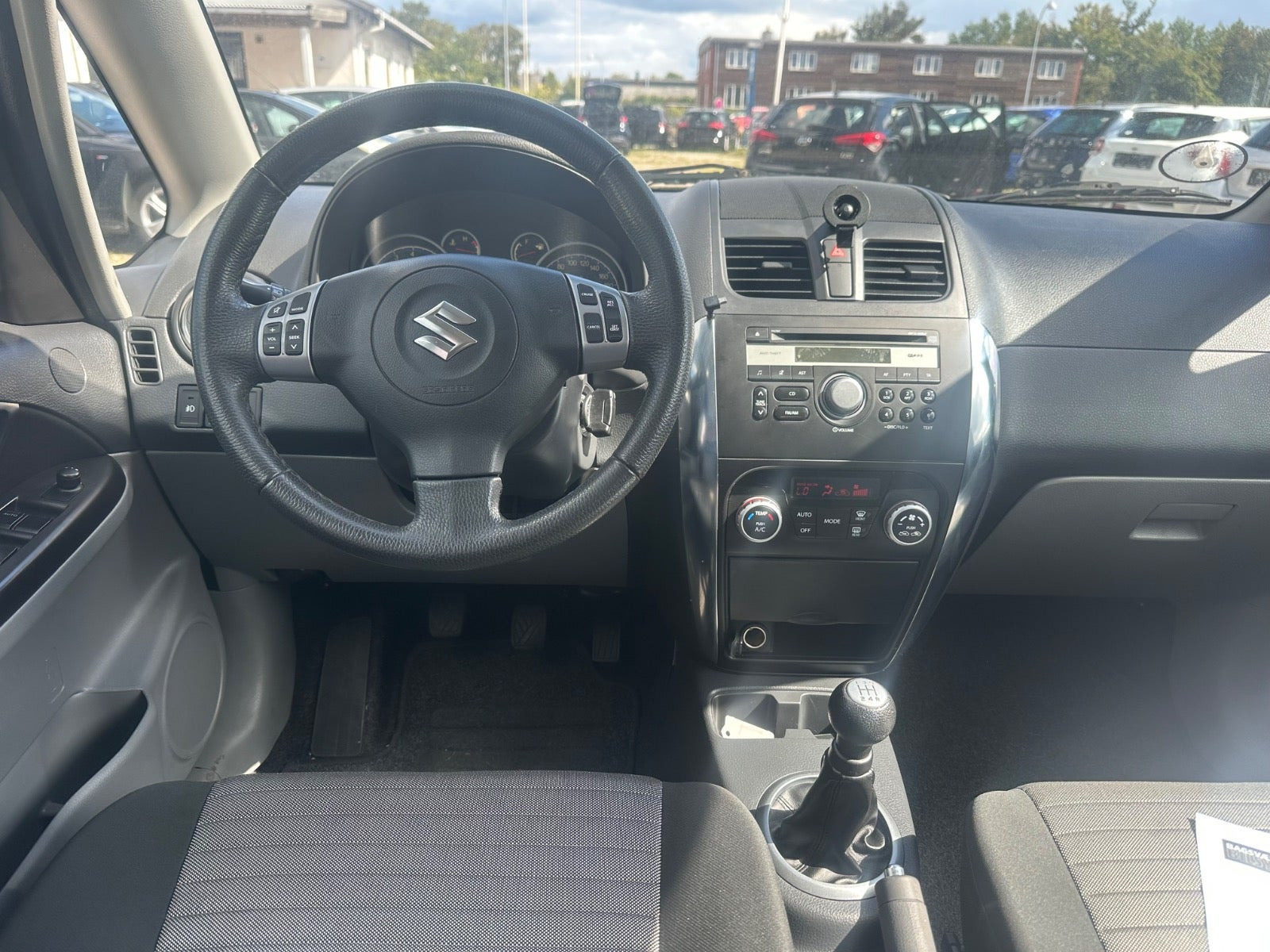 Sølv Suzuki SX4 fra 2011