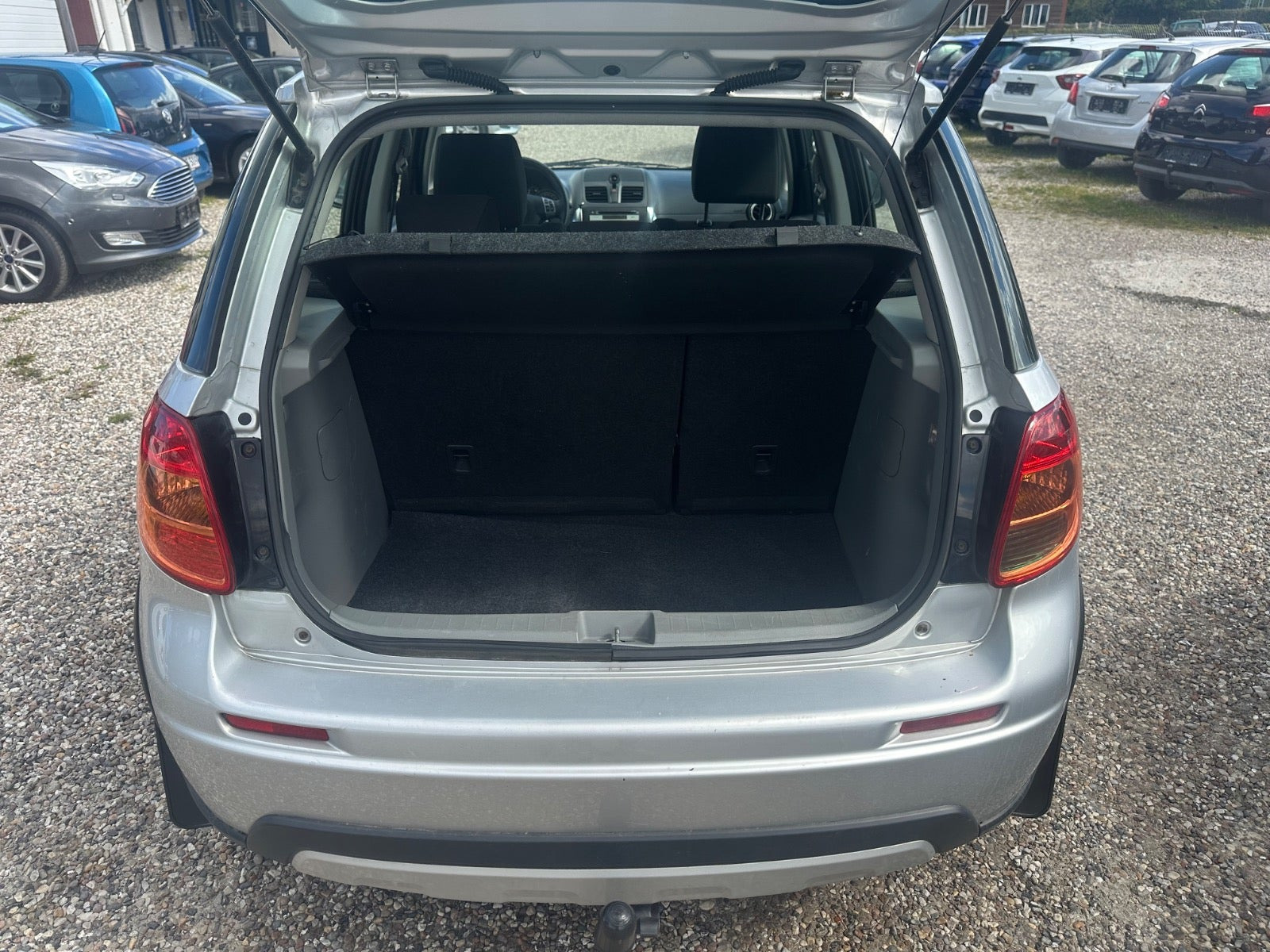 Sølv Suzuki SX4 fra 2011