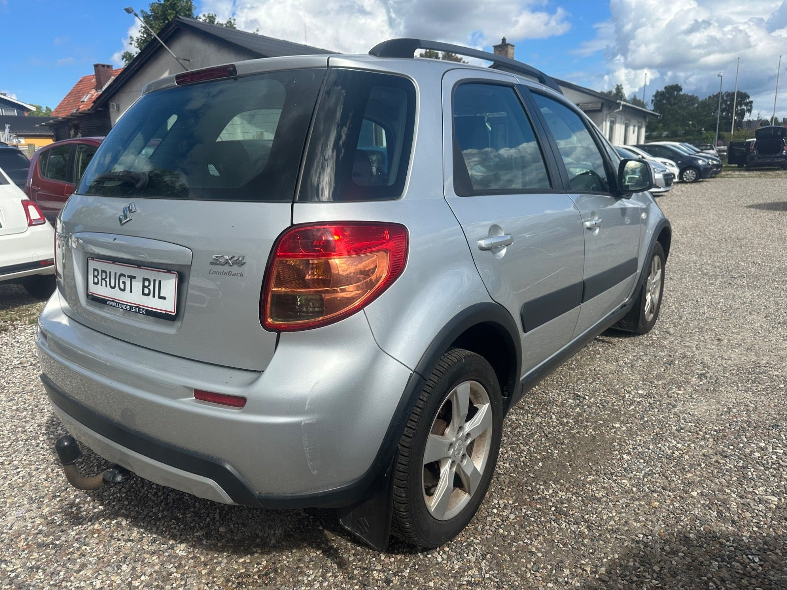 Sølv Suzuki SX4 fra 2011