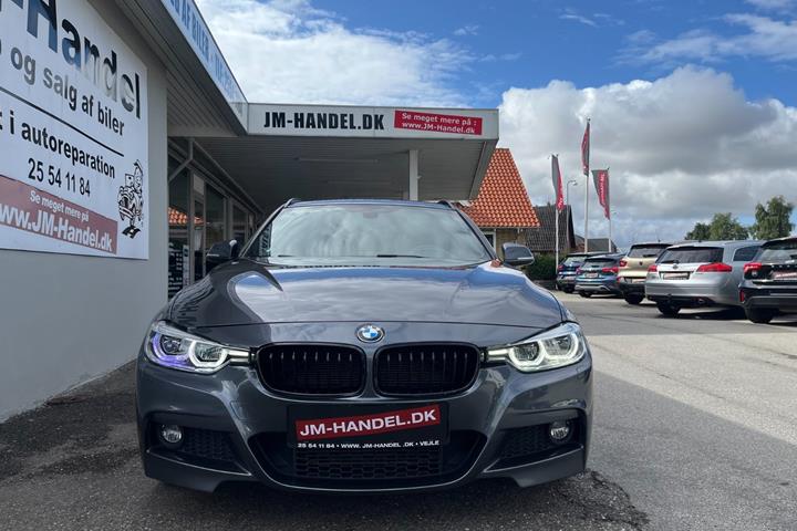 Grå BMW 320d fra 2019