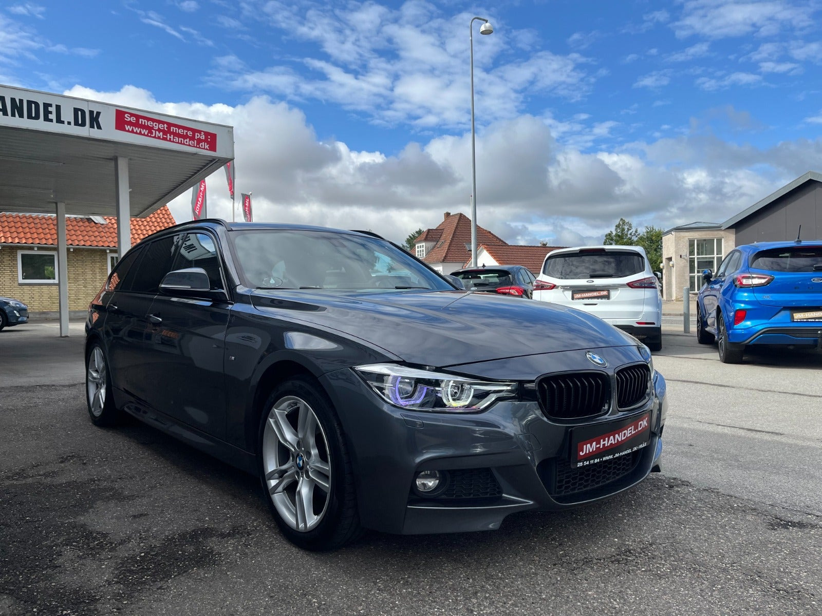 Grå BMW 320d fra 2019