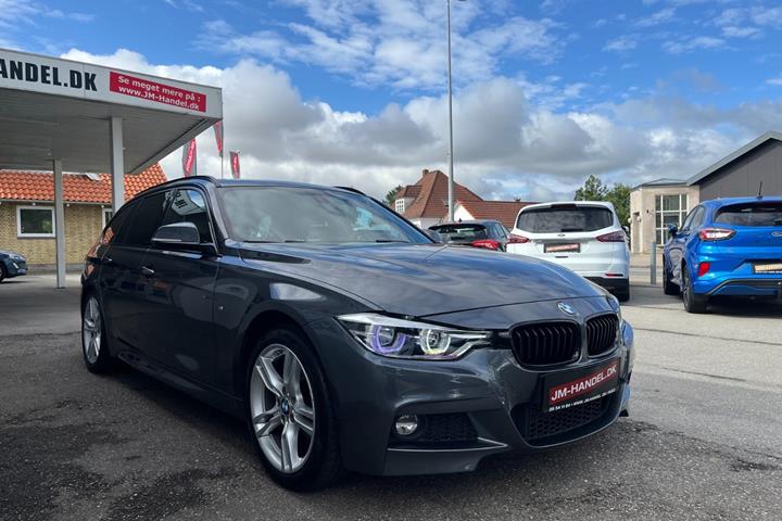 Grå BMW 320d fra 2019