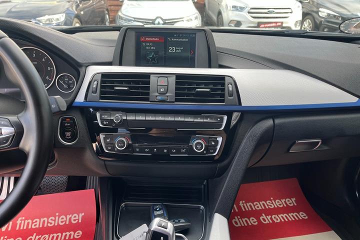 Grå BMW 320d fra 2019