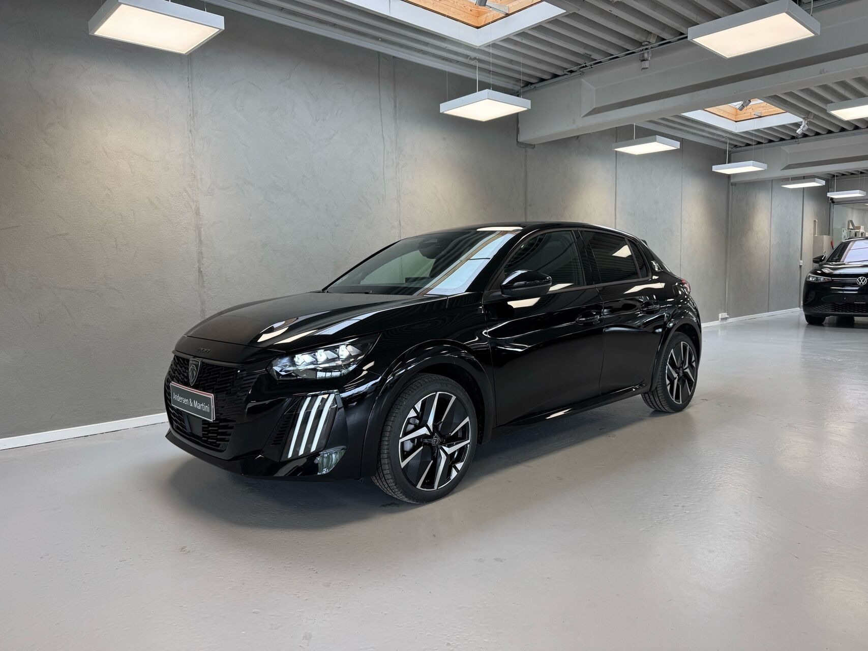 Sort Peugeot e-208 fra 2026