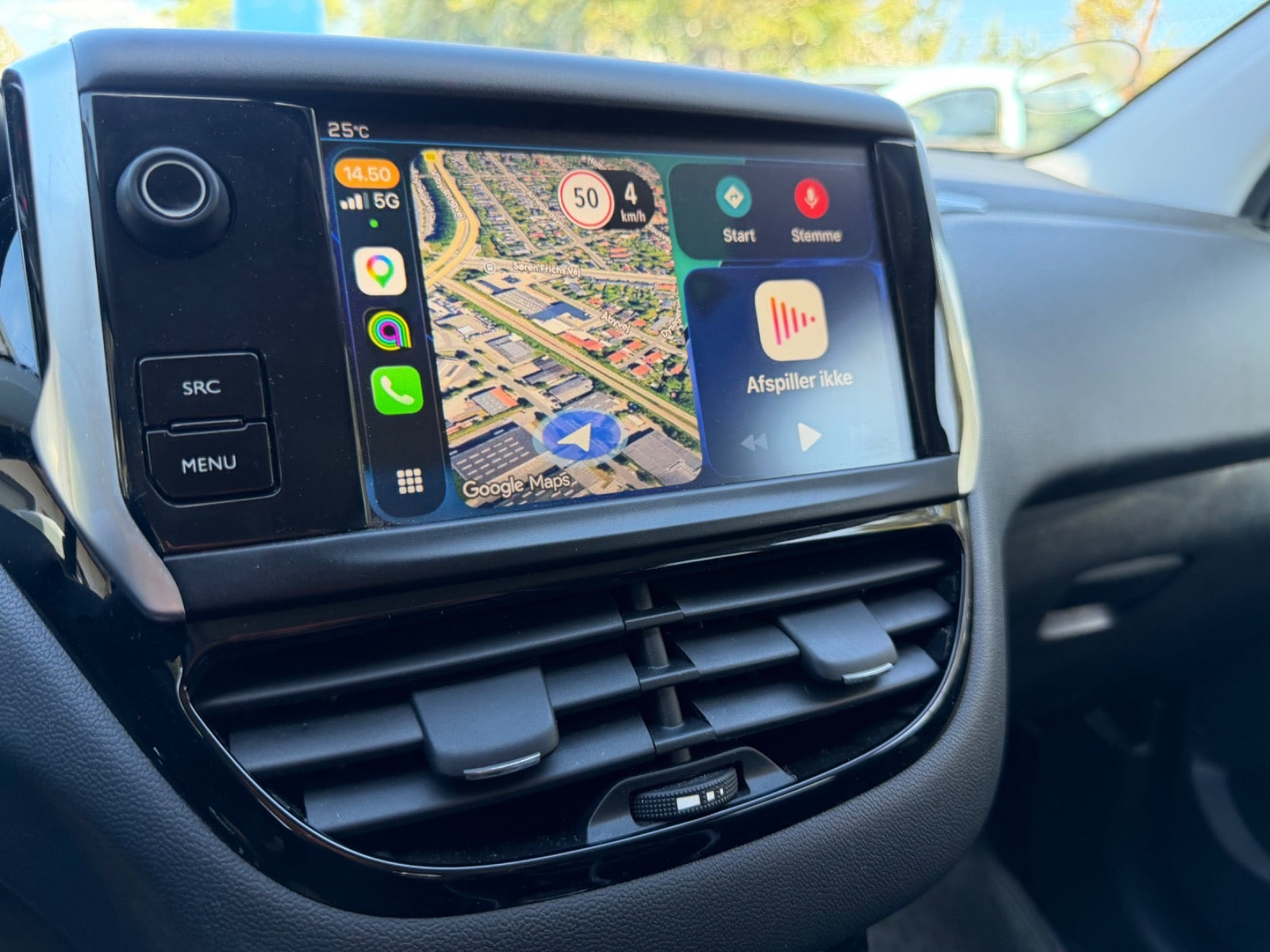 Grøn Peugeot 208 fra 2019