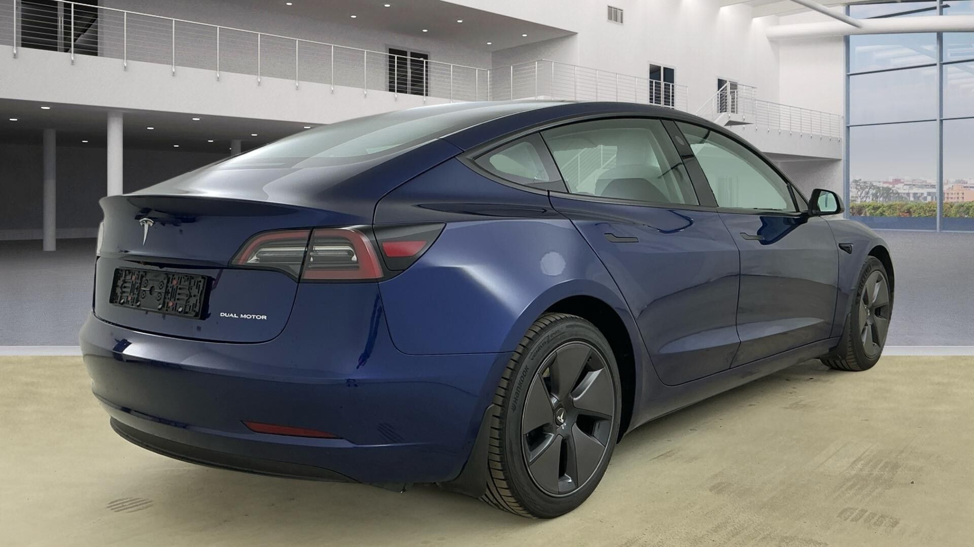 Blå Tesla Model 3 fra 2023