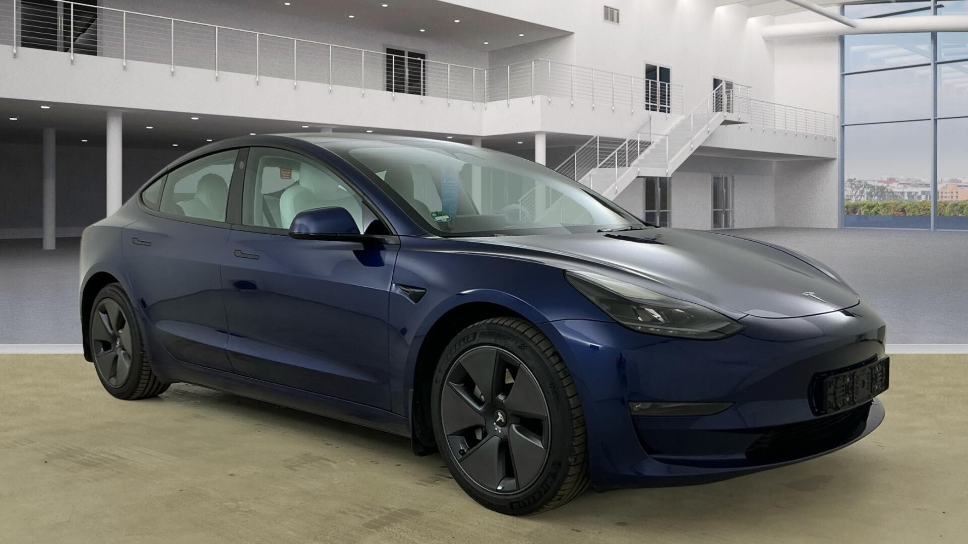 Blå Tesla Model 3 fra 2023
