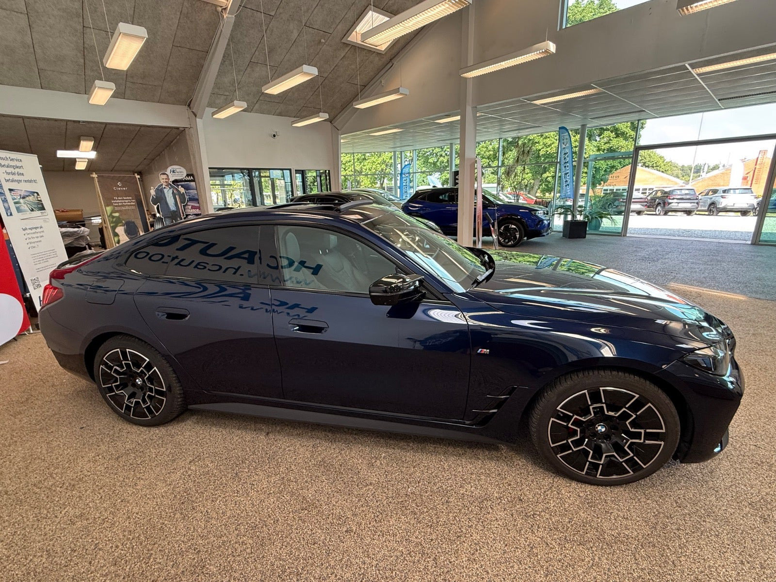 Blå BMW i4 fra 2024