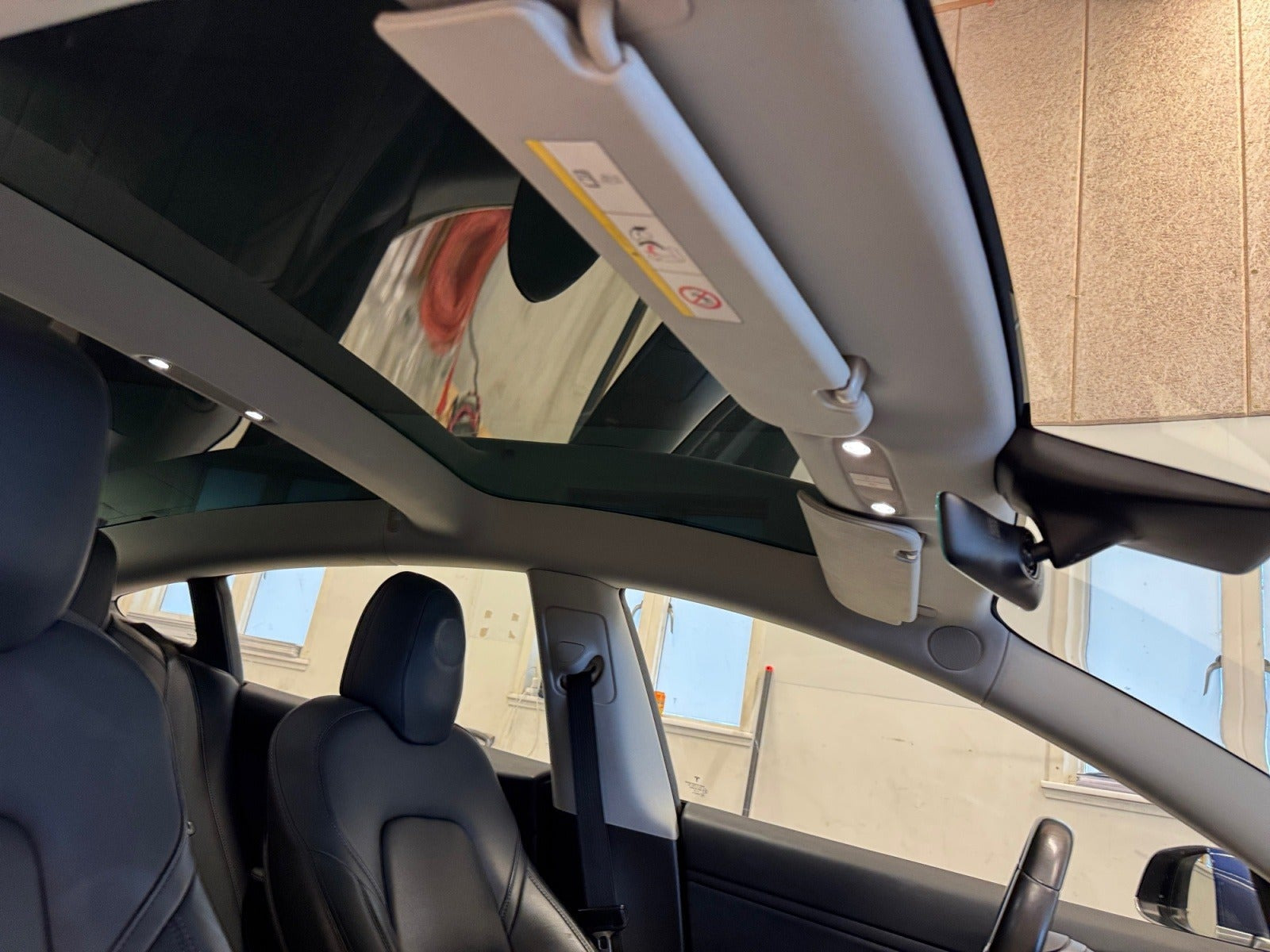 Blå Tesla Model 3 fra 2019